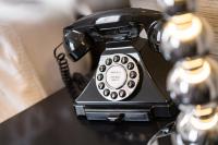 a black phone sitting on top of a table at The Chamberlain in London