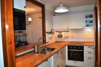 Kuchyň nebo kuchyňský kout v ubytování Apartamento con Jardín Platja d'Aro