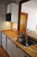 Kuchyň nebo kuchyňský kout v ubytování Apartamento con Jardín Platja d'Aro