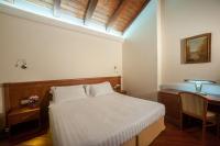 Posteľ alebo postele v izbe v ubytovaní Hotel Flora