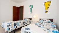 Postel nebo postele na pokoji v ubytování Villa Isla Feliz