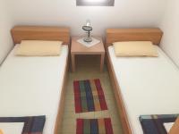 Posteľ alebo postele v izbe v ubytovaní Apartments Lavanda