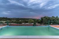The swimming pool at or close to Villa Antikleia