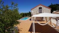 The swimming pool at or close to Villa Antikleia
