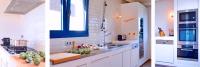 A kitchen or kitchenette at Manuki Mas