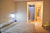 A bed or beds in a room at Manuki Mas