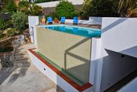 The swimming pool at or close to Manuki Mas