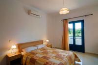 Postel nebo postele na pokoji v ubytování Fotini Apartments