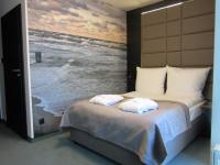Posteľ alebo postele v izbe v ubytovaní Armada Holiday House