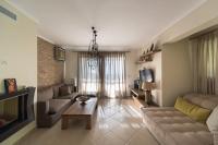 TV a/nebo společenská místnost v ubytování Elani Villa Dieci by Luxlikehome