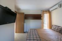 Postel nebo postele na pokoji v ubytování Elani Villa Dieci by Luxlikehome