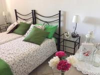 A bed or beds in a room at Appartamenti Monte Alago
