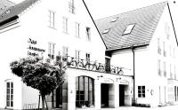 a black and white photo of a building at Altstadthotel Haßfurt GbR in Haßfurt