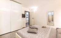 A bed or beds in a room at Villa Serena
