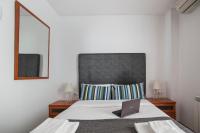 Postel nebo postele na pokoji v ubytování Tendency Apartments Fira