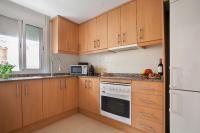Kuchyň nebo kuchyňský kout v ubytování Tendency Apartments Fira