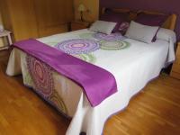Posteľ alebo postele v izbe v ubytovaní Apartaments El Ribal