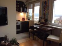 Kuchyňa alebo kuchynka v ubytovaní Widokowy Apartament nad Jeziorem