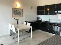 Kuchyň nebo kuchyňský kout v ubytování Apartments Victoria Privlaka