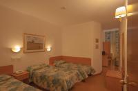 Posteľ alebo postele v izbe v ubytovaní Hotel Tirreno