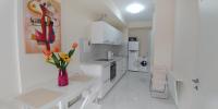 Kuchyň nebo kuchyňský kout v ubytování Galatex Beach Apartment