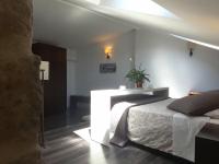 A bed or beds in a room at Apartamentos Sol de Mayo