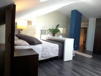 A bed or beds in a room at Apartamentos Sol de Mayo