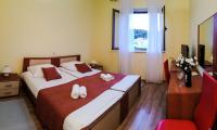 Posteľ alebo postele v izbe v ubytovaní Guesthouse Pomena