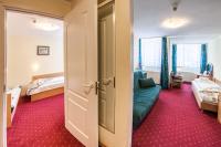Posteľ alebo postele v izbe v ubytovaní Hotel Jaskółka