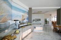 A kitchen or kitchenette at Hotel Excelsior