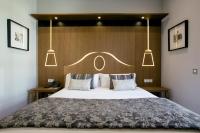 Posteľ alebo postele v izbe v ubytovaní Legazpi Doce Rooms & Suites