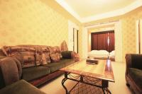 a living room with a couch and a table at K-ONE Homestay in Hualien City