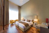 Fraser Suites Diplomatic Area Bahrainにあるベッド