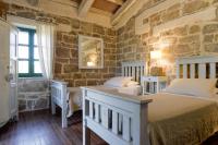 A bed or beds in a room at Villa in Campagna con Piscina Privata