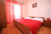 Posteľ alebo postele v izbe v ubytovaní Apartments Lea