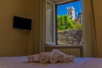 Łóżko lub łóżka w pokoju w obiekcie Hotel Pax
