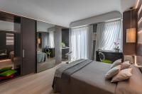 Posteľ alebo postele v izbe v ubytovaní Hotel Mastino