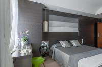 Posteľ alebo postele v izbe v ubytovaní Hotel Mastino