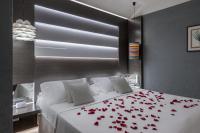 Posteľ alebo postele v izbe v ubytovaní Hotel Mastino