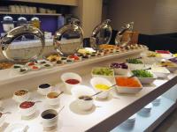 a buffet line with many different types of food at KDM Hotel in Taipei