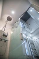 A bathroom at Camp Nou, Europa Fira - modern two-bedroom apartment with heating