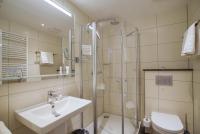Koupelna v ubytování Hotel Maxim