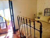 A bed or beds in a room at Chalecito en la Herradura- Casa Kwetu