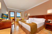 A bed or beds in a room at Hotel IPV Palace & Spa - Adults Recommended