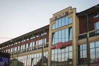 a building with a sign on the front of it at Alina Hotel &amp; Hostel in Uzhhorod