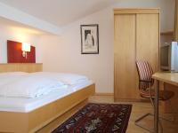 Posteľ alebo postele v izbe v ubytovaní Gastwirtschaft & Hotel Holzinger