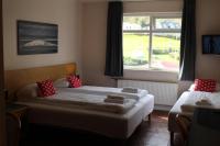 Postel nebo postele na pokoji v ubytování North Star Hotel Olafsvik