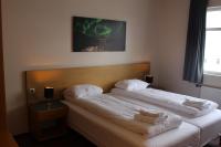Postel nebo postele na pokoji v ubytování North Star Hotel Olafsvik