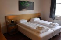 Postel nebo postele na pokoji v ubytování North Star Hotel Olafsvik