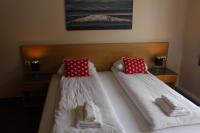 Postel nebo postele na pokoji v ubytování North Star Hotel Olafsvik